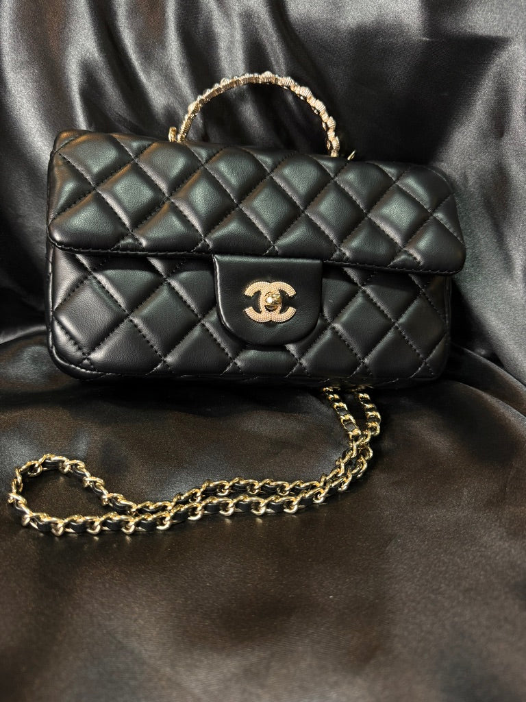 Chanel Classic Negra Asa de Perlas