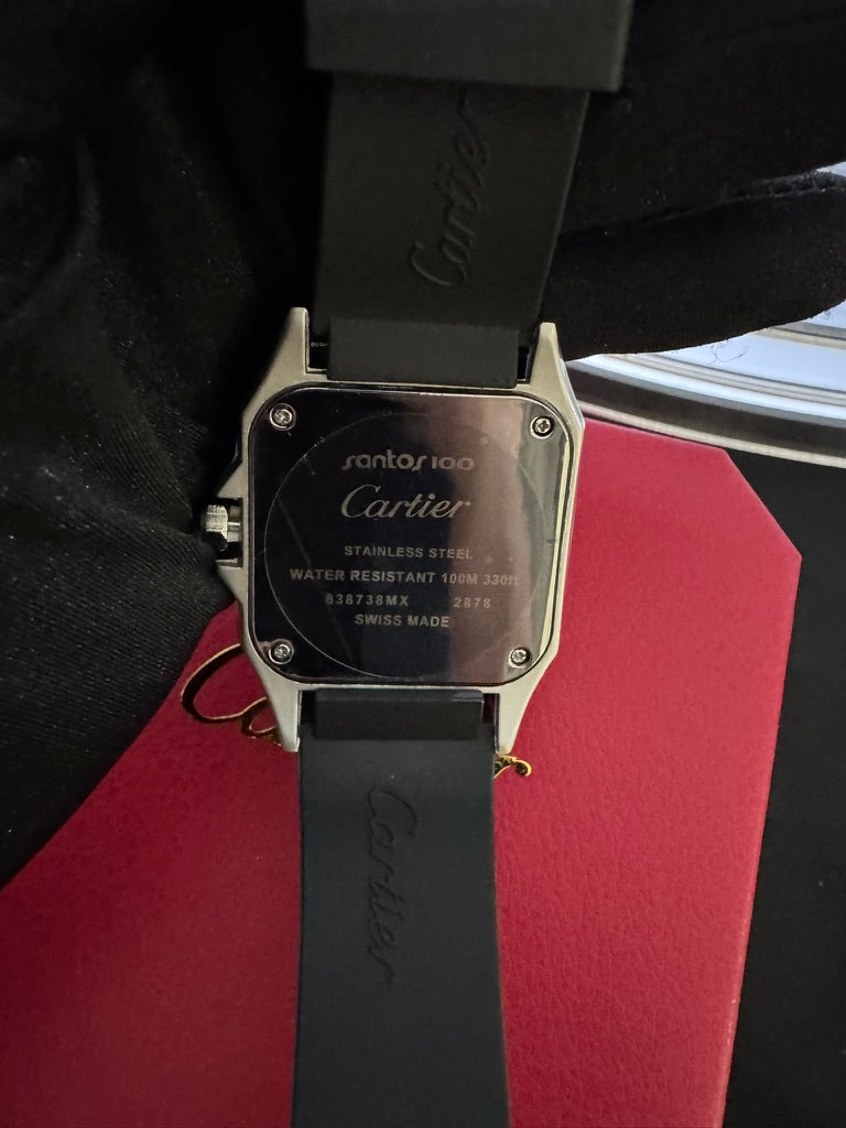 Reloj Cartier Santos Caucho Carátula Negra y Dorado