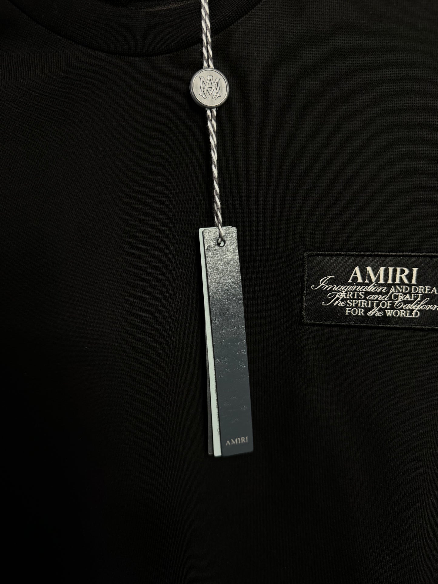 Playera Amiri Parche Bordado Negra UA