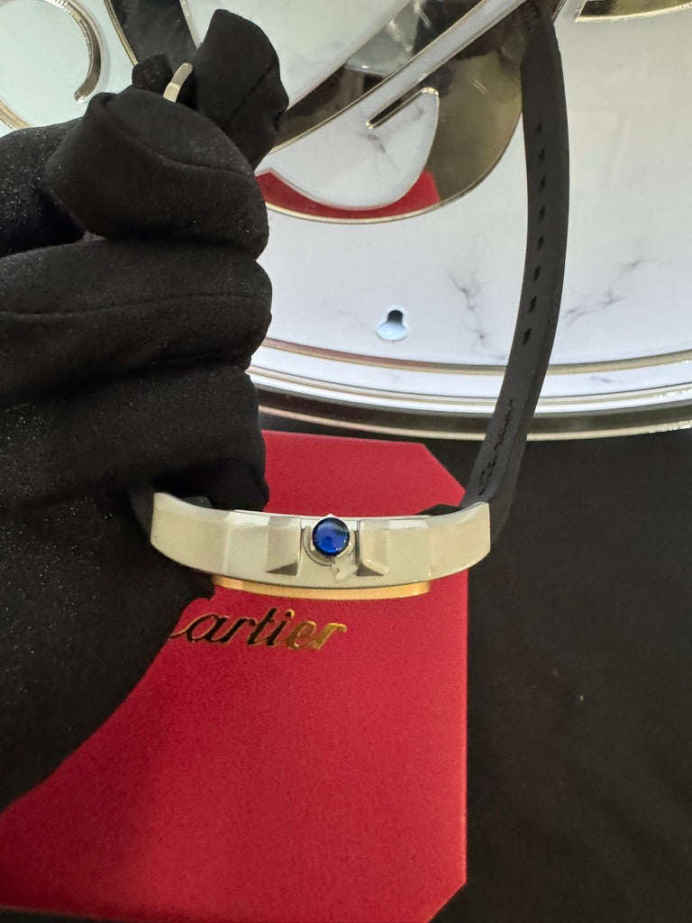 Reloj Cartier Santos Caucho Carátula Negra y Dorado