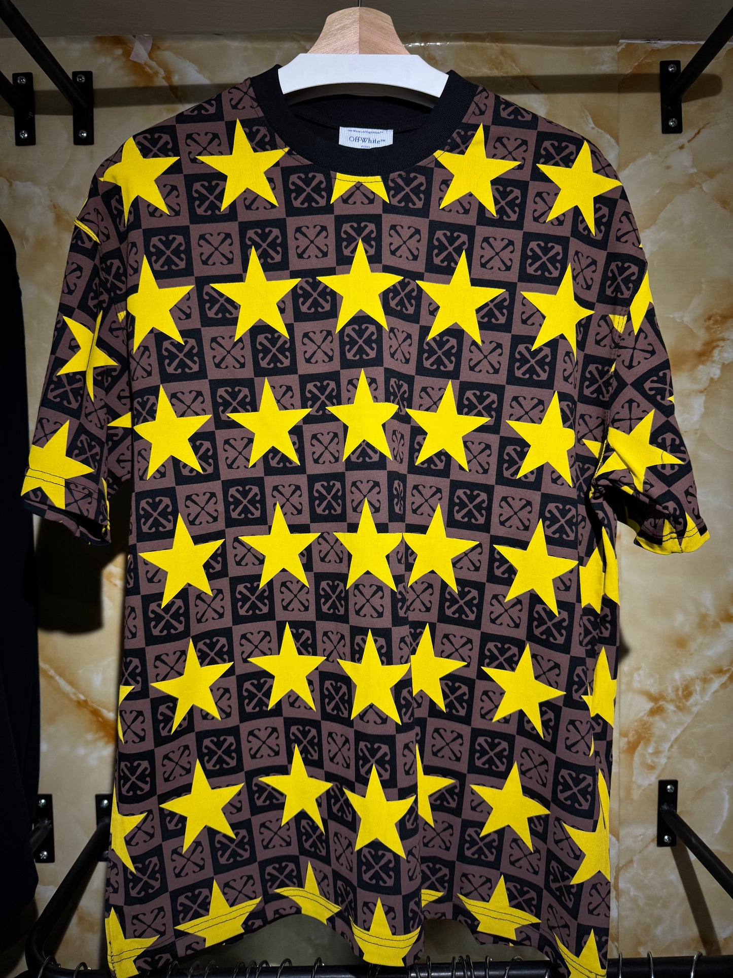 Off-White™ “Monogram Stars All-Over Print T-Shirt”.