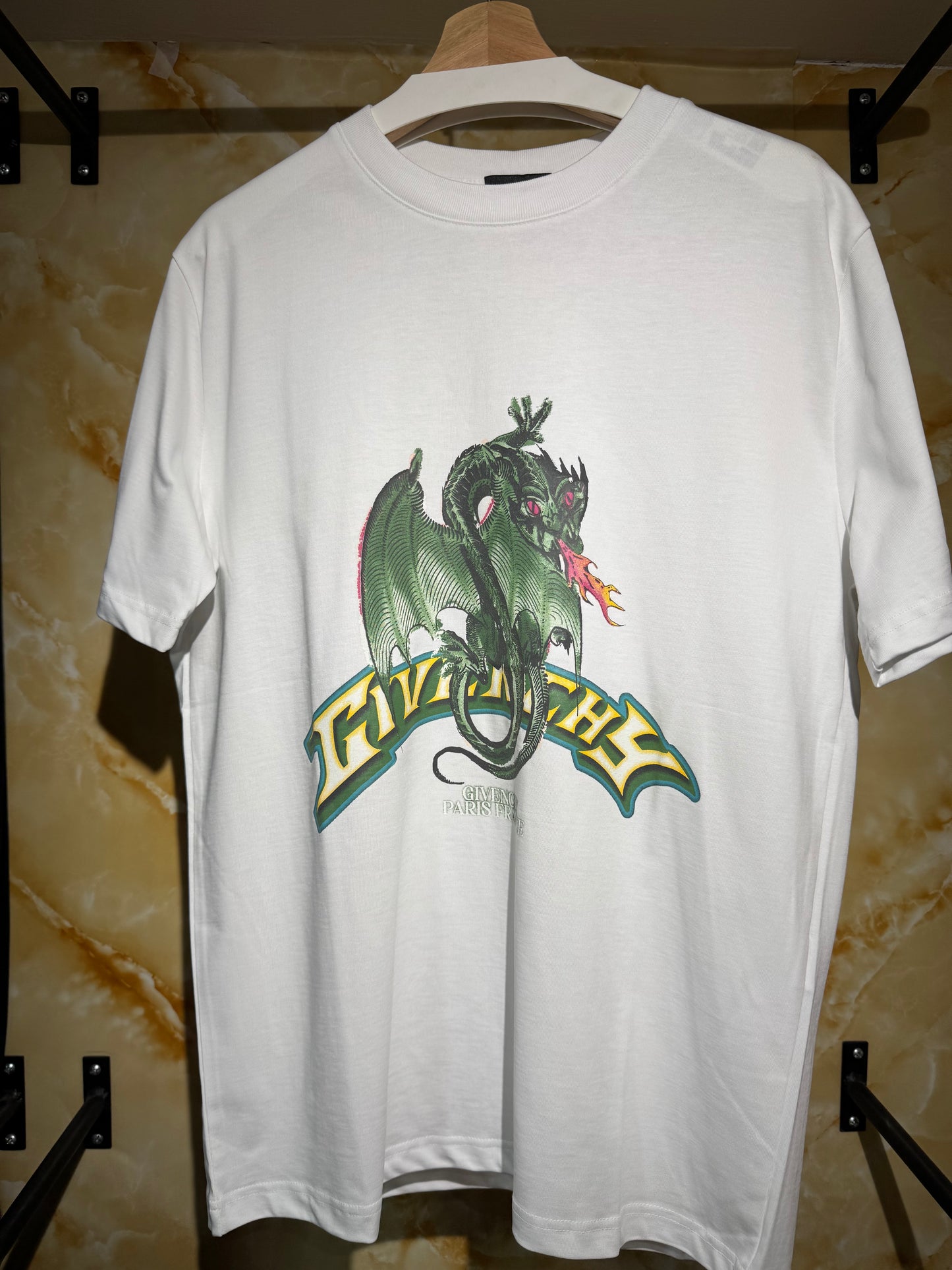 Givenchy “Dragon Graphic T-Shirt”.